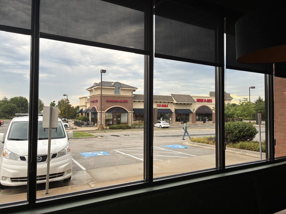 Rain-spotted windows on a cloudy day in Johnson County, Kansas